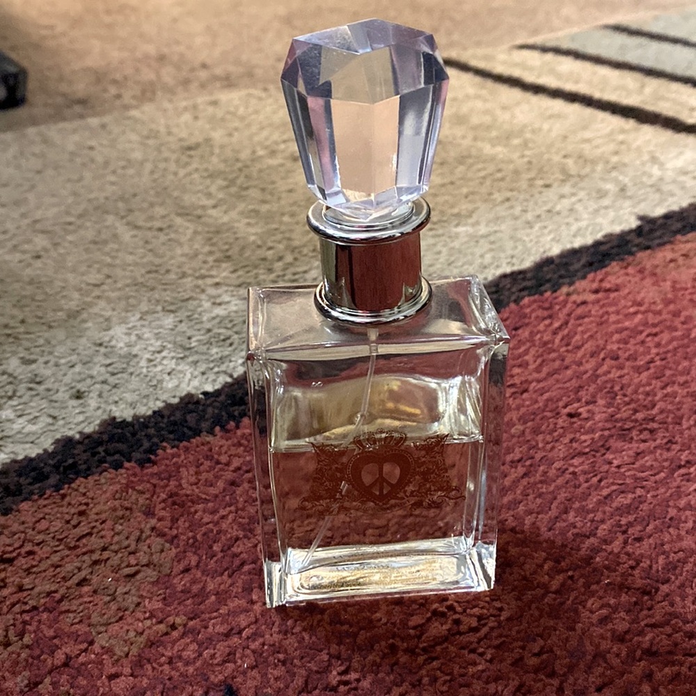 Peace love and juicy couture perfume. A little over half a bottle.
